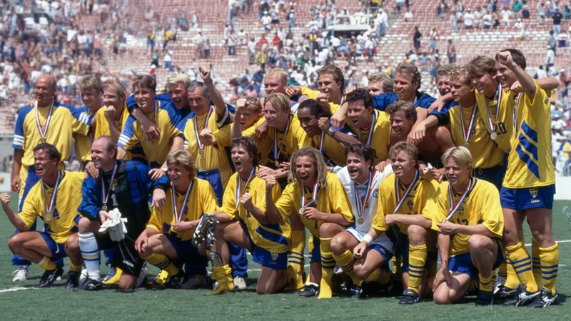 Andersson on Sweden's 1994 World Cup third place finish Kennet Andersson in Sweden's yellow jersey at the 1994 World Cup, celebrating with teammates Martin Dahlin and Tomas Brolin.