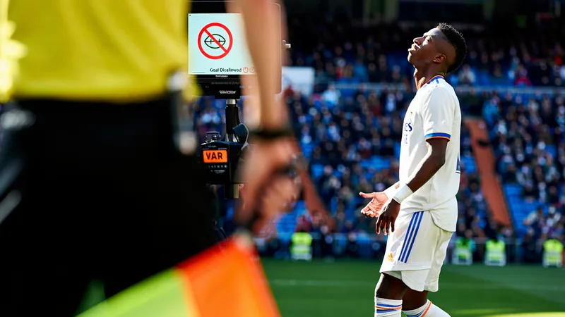 Vinicius Junior reacts after a goal is disallowed following a VAR review for a foul in the build-up. — latest news and analysis.