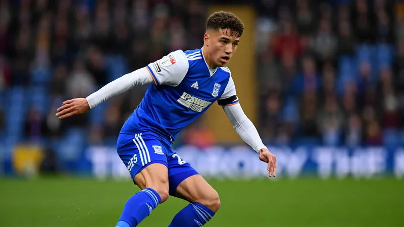 Bristol City target Ipswich defender Harry Clarke Harry Clarke in action for Ipswich Town during a Championship match, wearing blue kit.