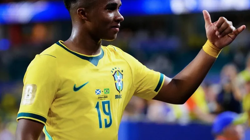Endrick smiling in Brazil national team kit, looking forward to Real Madrid return under Mourinho — latest news and analysis.