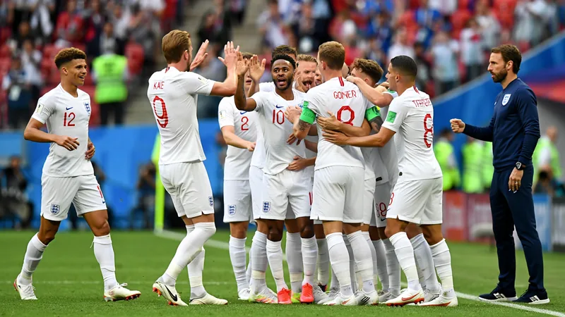 England players celebrate after a goal against Panama in a World Cup group match.