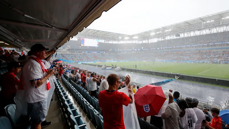 England friendly halted by torrential rain in Florida England fans huddle under cover as torrential rain pours down at a stadium in Florida, forcing suspension of the friendly against Costa Rica.