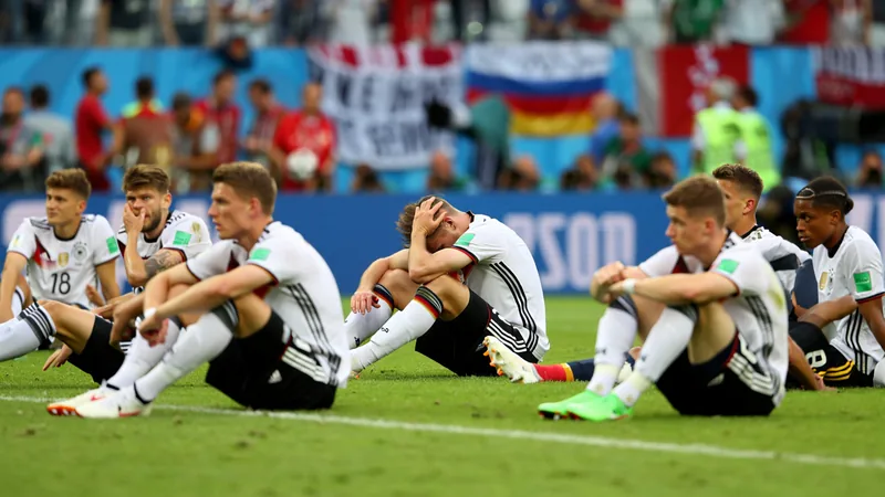 Germany players dejected after World Cup exit against Paraguay