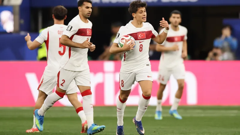 Arda Guler celebrates after scoring for Türkiye against USA in a FIFA World Cup 2026 group stage match at Los Angeles Stadium.