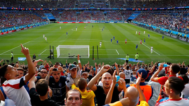 World Cup hydration breaks: fans boo, players adapt Fans in a stadium booing during a hydration break at a World Cup match, with players on the field drinking water. — latest news and analysis.
