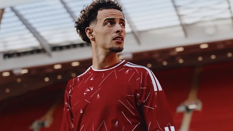 Inter's €25m Verbal Offer for Curtis Jones Rejected by Liverpool Curtis Jones in Liverpool kit during a match, with Inter Milan and Liverpool logos in background — latest news and analysis.