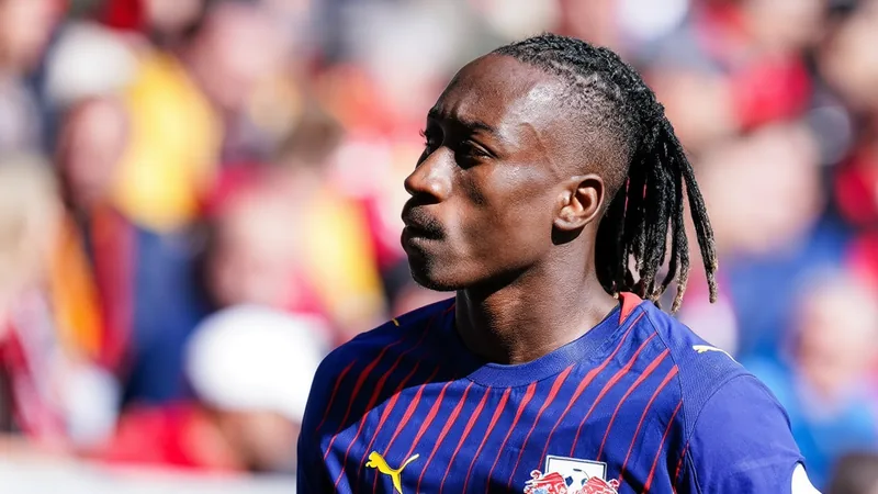 Yan Diomande in action for RB Leipzig, with Liverpool and PSG interested in signing the 19-year-old winger. — latest news and analysis.
