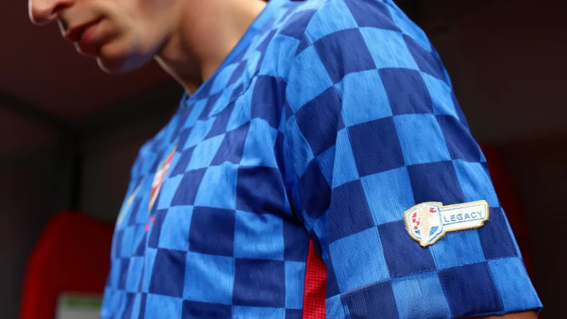 Luka Modrić Special Legacy Badge on Shirt Luka Modrić wearing a special legacy badge on his football shirt