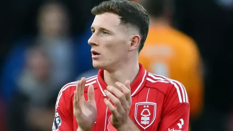 Elliot Anderson in action for Nottingham Forest during a Premier League match.