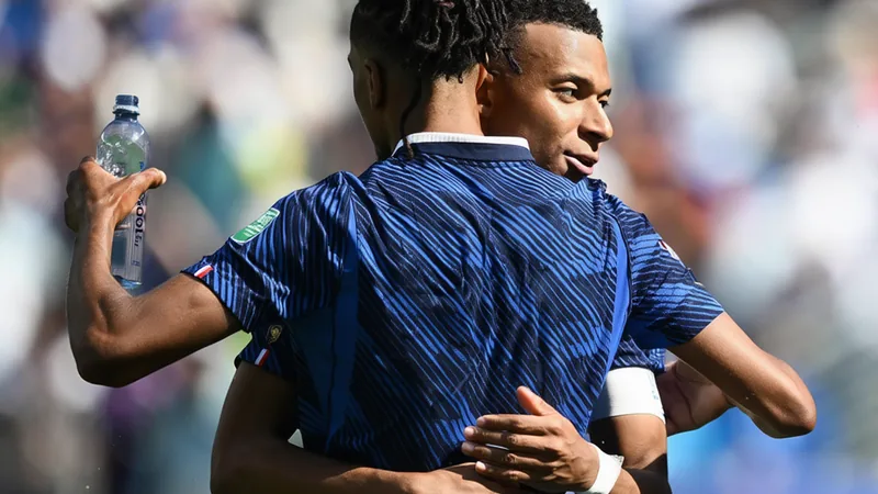Mbappe and Olise Show Promising Link-Up in France's World Cup Opener Kylian Mbappe celebrates after scoring against Senegal, with Michael Olise in the background, during France's World Cup Group I match.