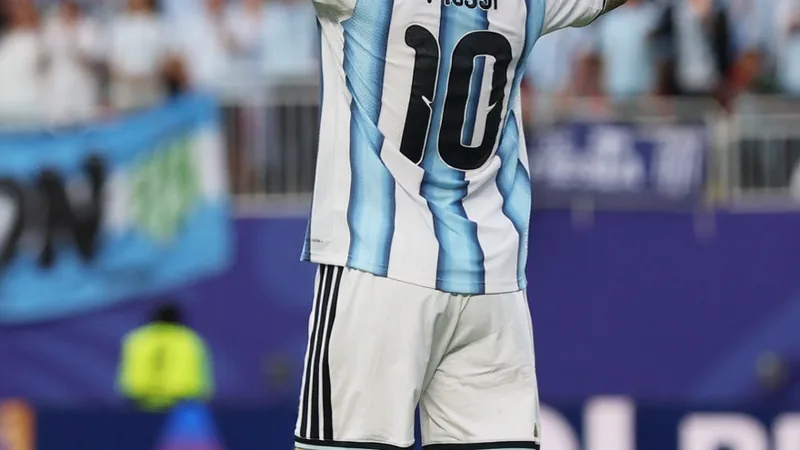 Lionel Messi celebrating after scoring for Argentina in a World Cup match.