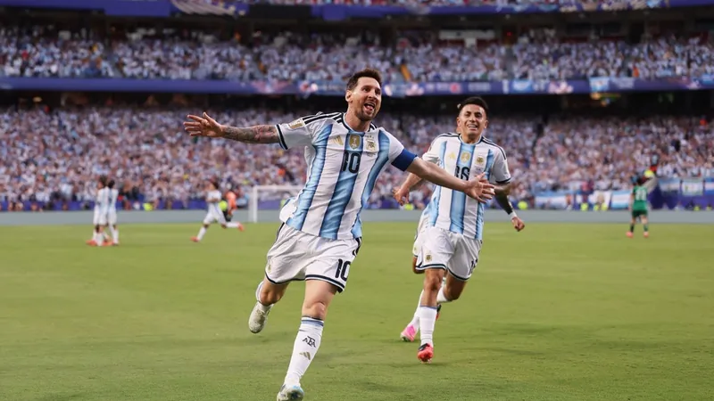 Lionel Messi celebrating a goal in a World Cup match, with the scoreboard showing his 14th goal. — latest news and analysis.