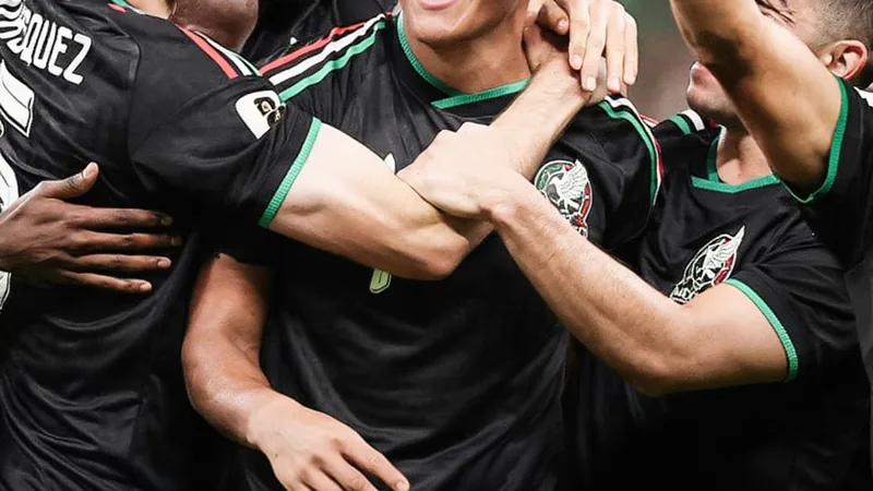 Mexico beat South Korea, earn 6 points in two games Mexican football players celebrating a victory on the pitch after beating South Korea