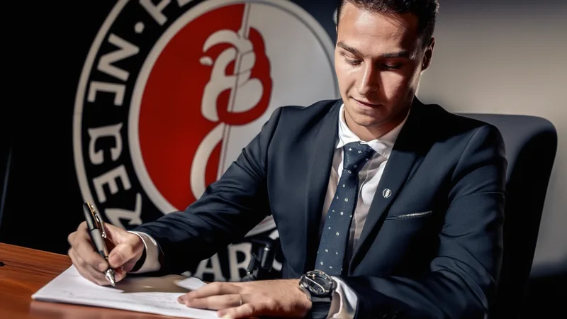 Mika Marmol to Feyenoord: Contract Until 2030 Mika Marmol signing a contract with Feyenoord, with the club logo in the background.