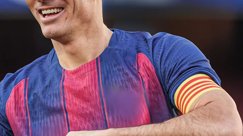 Robert Lewandowski in a soccer kit, looking focused, with a blurred background of a stadium. — latest news and analysis.