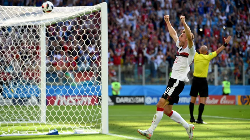 Schmid scores stunning opener for Austria Austrian player Romano Schmid celebrates after scoring a goal with a powerful strike into the top corner. — latest news and analysis.