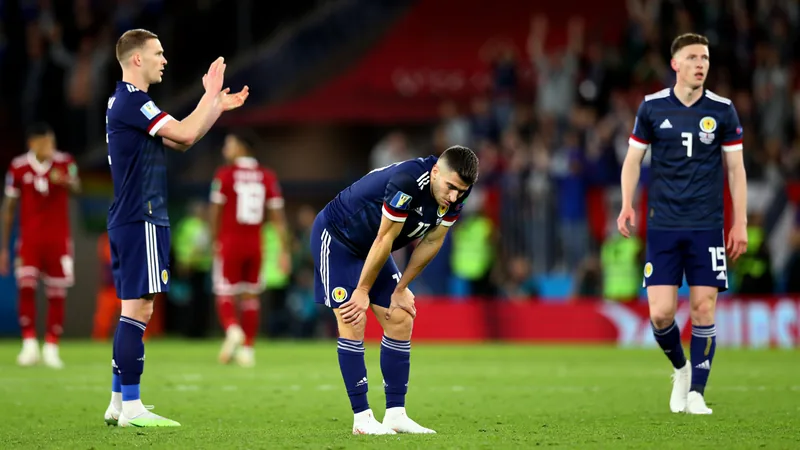 Scotland players react during World Cup Group C match against Morocco in Boston