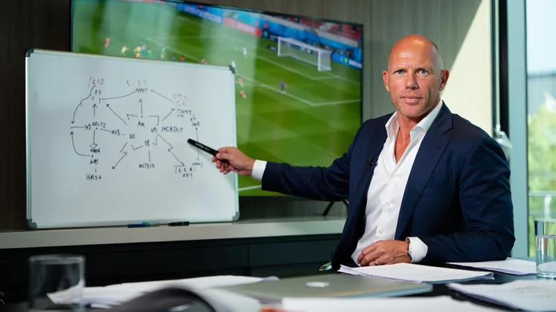 Alan Shearer analyzing World Cup group stage action