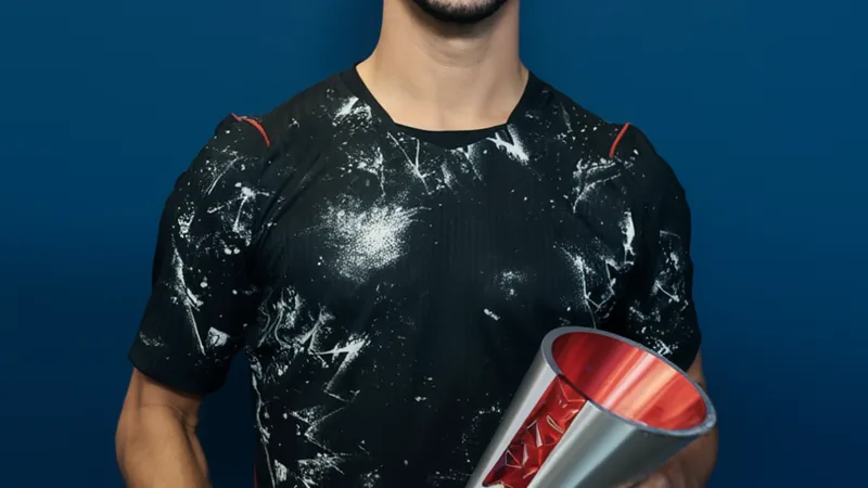 Canada midfielder Stephen Eustaquio holding the FIFA Man of the Match award