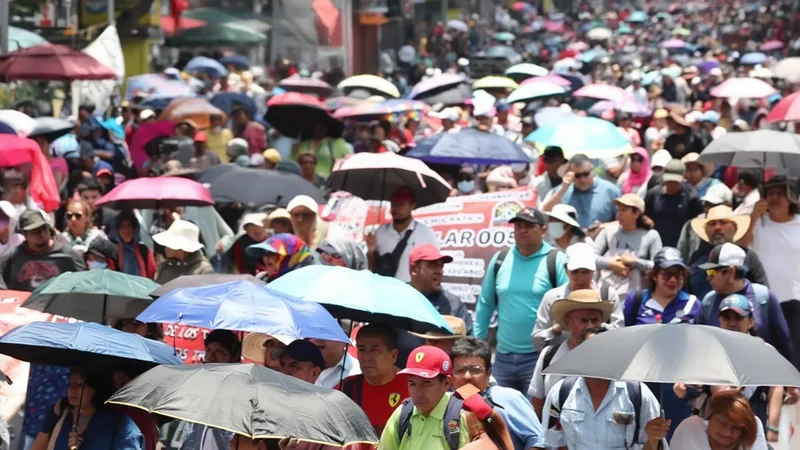 Teacher strike keeps 1.4 million Mexican students out of class Mexican teachers holding signs during a strike protest, with a school building in the background — latest news and analysis.