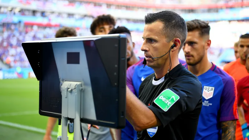 VAR diving decision at World Cup wrong despite feeling right Referee Danny Makkelie reviews a VAR monitor during the USA vs Paraguay World Cup match, with players waiting. — latest news and analysis.