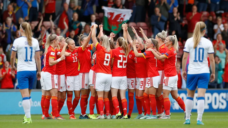 Wales women's football team celebrating a goal against Czech Republic in Cardiff during World Cup qualifying. — latest news and analysis.