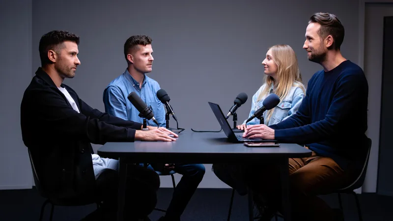 Football Daily podcast hosts Rick Edwards and Lloyd Griffith with guests discussing Germany and Netherlands World Cup exits.