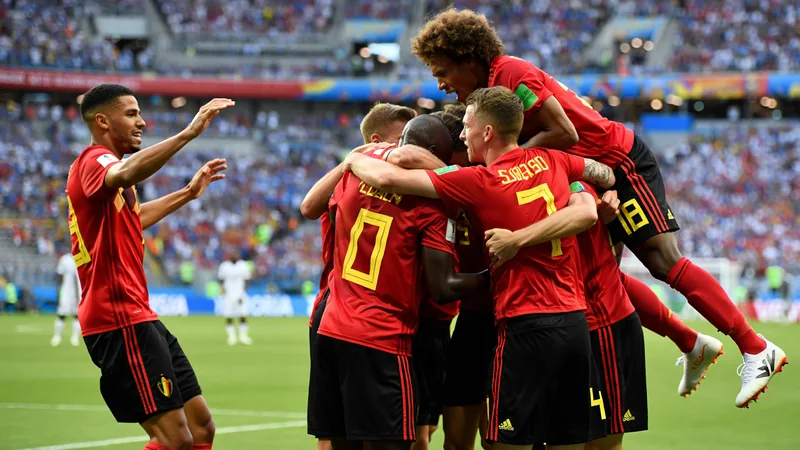 Belgium beat US 2-0, set up World Cup quarter-final with Spain Belgium players celebrate after scoring against the United States in a World Cup match.