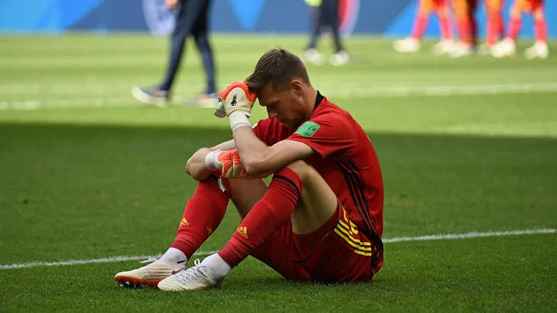Belgium's golden generation ends with Lammens error Senne Lammens looks dejected after spilling a shot that led to Spain's winning goal in the World Cup quarter-final. — latest news and analysis.