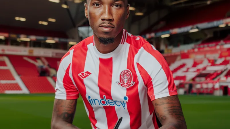 Brentford sign Jaidon Anthony from Burnley for £17m plus add-ons Jaidon Anthony in Brentford kit, signing contract at Brentford stadium