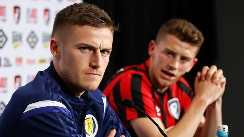 Ryan Christie in Scotland kit, looking determined, with Bournemouth midfielder expressing desire for more major tournament appearances.
