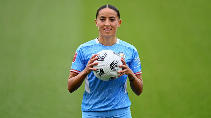 England defender Niamh Charles joins Man City from Chelsea Niamh Charles in Manchester City kit holding a football, with the City badge visible, smiling at the camera. — latest news and analysis.
