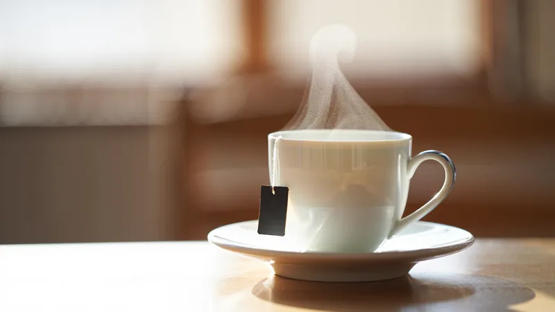 England fans in US struggle to find decent tea A cup of tea with a tea bag and steam rising, representing the struggle of England fans in the US to find a decent brew.