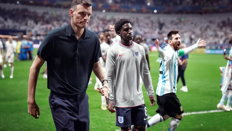 England lose World Cup final after Tuchel's tactical errors England players dejected after losing World Cup final 2-1 to Argentina, with Lionel Messi celebrating in the background.