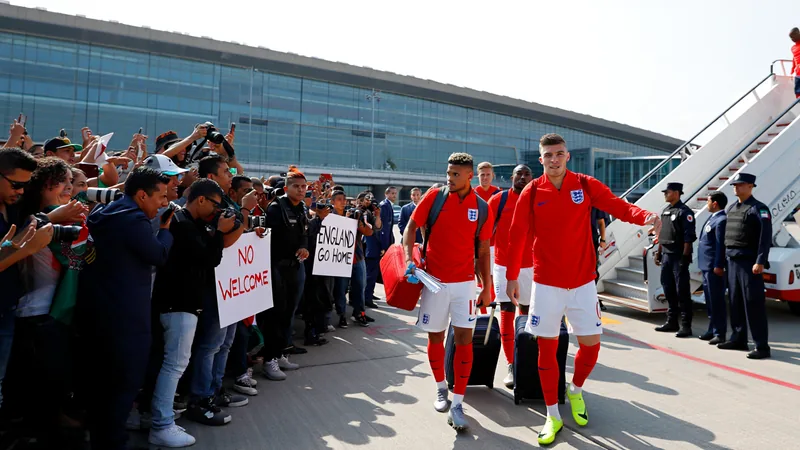 England football team arriving in Mexico, greeted by booing fans