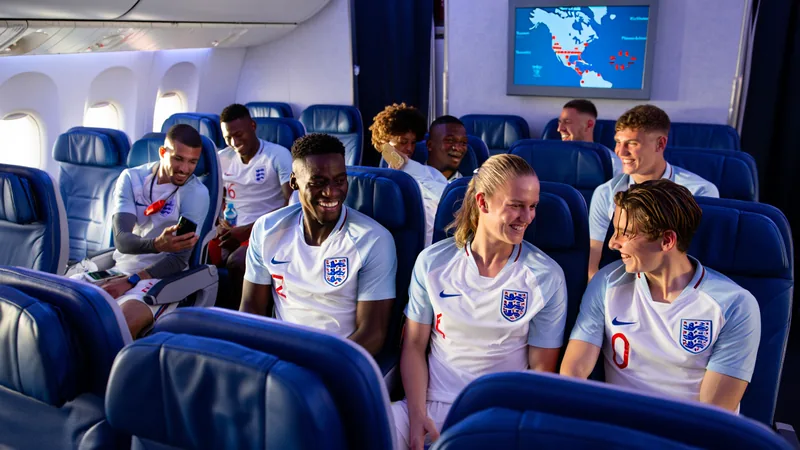 England football team on a plane, with a map of North America showing their travel routes between host cities. — latest news and analysis.