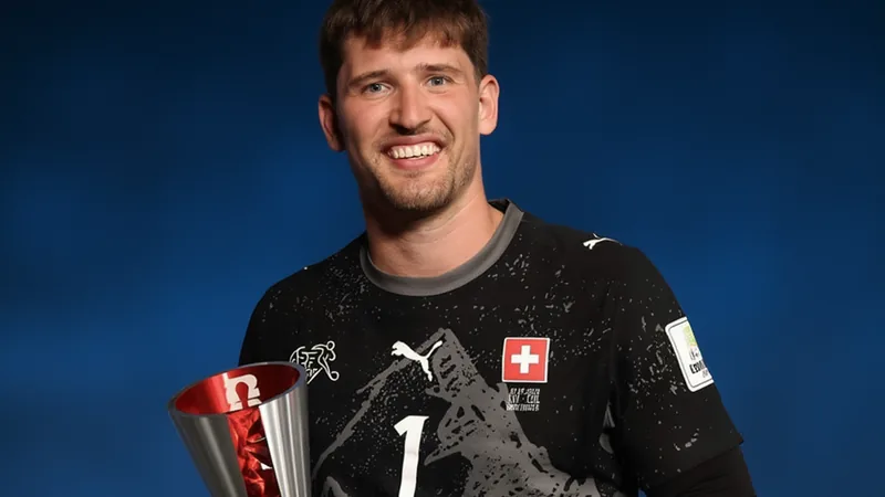 Gregor Kobel Man of the Match Switzerland Colombia Switzerland goalkeeper Gregor Kobel holding a Man of the Match award