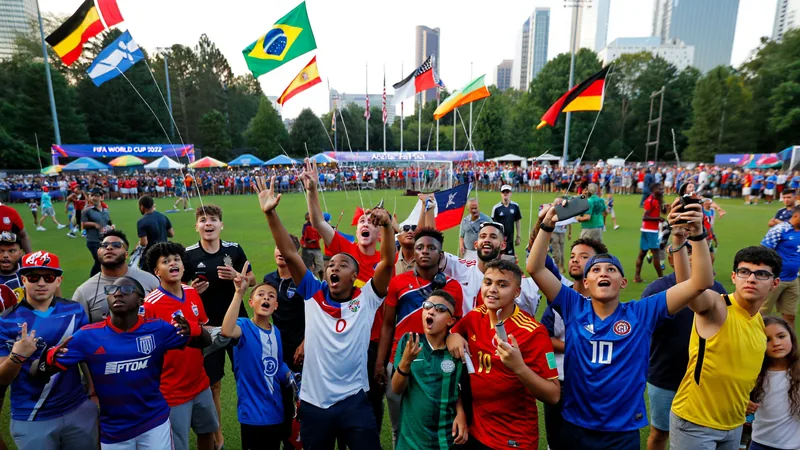 Has football fever taken hold in the US — latest news and analysis Fans in World Cup jerseys gather at a fan fest in Atlanta, with flags and banners visible, capturing the growing football fever in the US.
