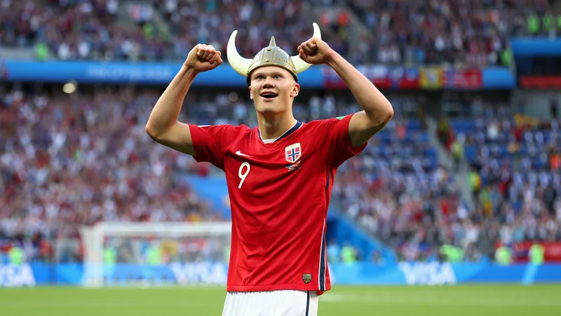 How Haaland Could Reach 260 International Goals Erling Haaland celebrates scoring for Norway in a World Cup match, wearing a Viking helmet and smiling. — latest news and analysis.