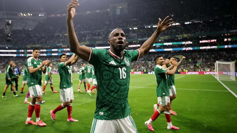Julián Quiñones in action at the World Cup, celebrating a goal contribution.