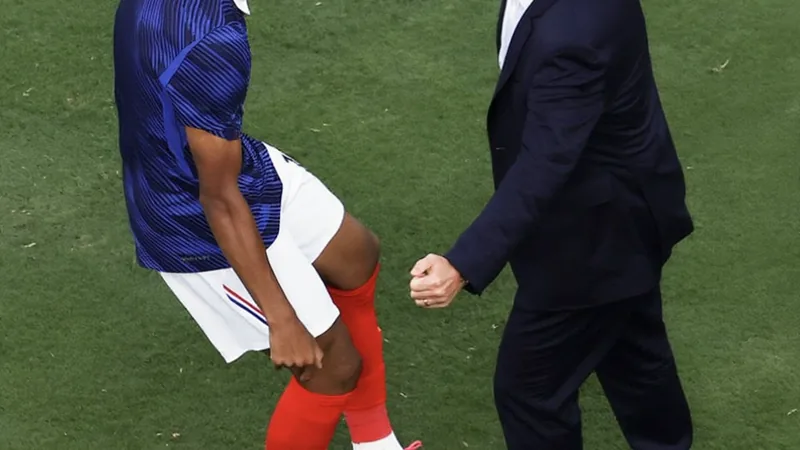 Kylian Mbappé celebrating a goal in a World Cup match