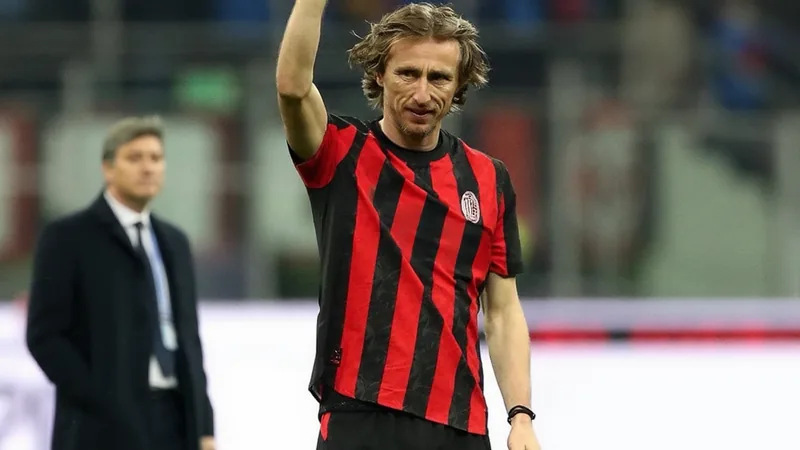Luka Modrić in AC Milan kit, with Rúben Amorim in background