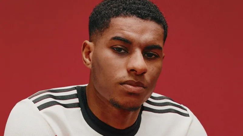 Men in Blazers Podcast: Rashford, Enzo, Diomandé, Barcola, Rogers Men in Blazers podcast cover art with football transfer news headlines