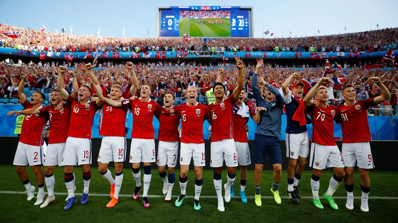 Norway's 28-Year World Cup Wait Ends with Brazil Clash Norwegian football players celebrate on the field after a World Cup match, with fans cheering in the background. — latest news and analysis.