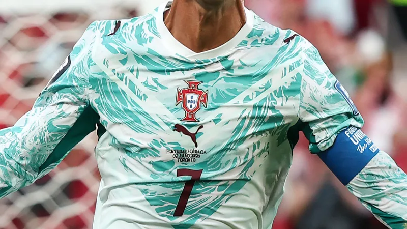 Cristiano Ronaldo celebrating after scoring for Portugal in a World Cup match.
