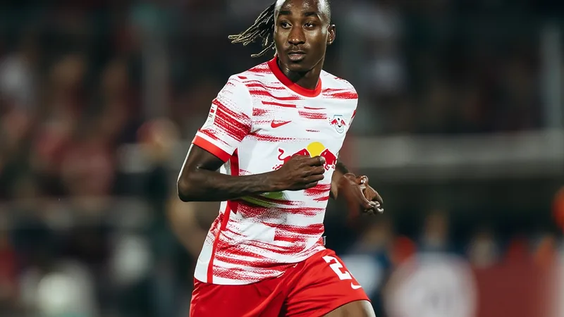 PSG Agreed Personal Terms with Diomandé in June Yan Diomandé in action on the football pitch, wearing an RB Leipzig jersey.