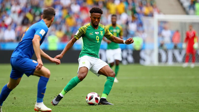 South Africa World Cup midfielder Jayden Adams dies at 25 Jayden Adams in South Africa national team kit, midfield action shot during World Cup match