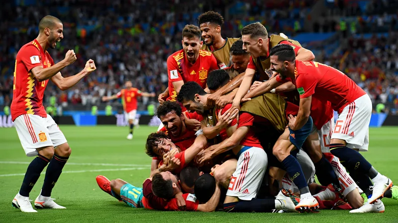 Spain into quarter-finals after Merino's late winner Spain players celebrate after Mikel Merino scores a stoppage-time winner against Portugal.
