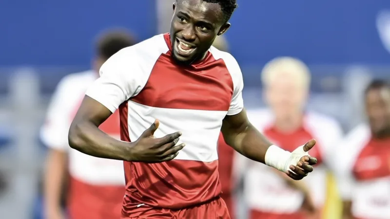 Joseph Opoku in action for Zulte Waregem during a match