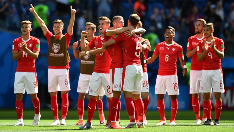 Switzerland end 88-year knockout drought with win over Algeria Switzerland players celebrating after their 2-0 win over Algeria in Vancouver